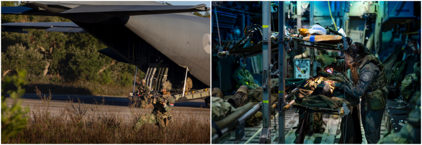 Militairen beveiligen met getrokken wapen een C-130 met open achterklep.