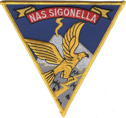 Het embleem van Naval Air Station Sigonella